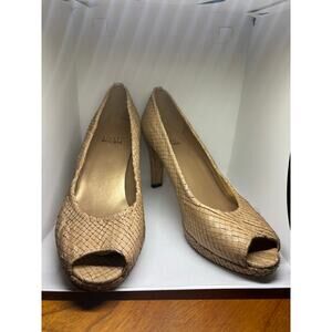 Stuart Whitman shiny snakeskin pumps in a size 8, in great condition.